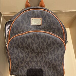 Michael Kors Brown and Orange Backpack with Monogram Pattern